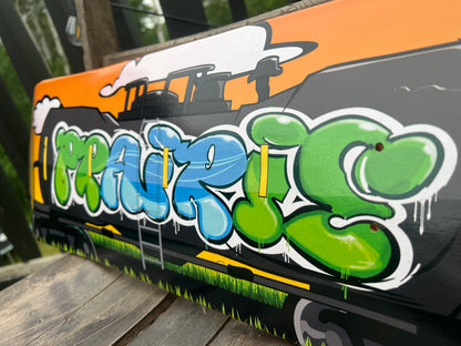 Graffiti Oil Train Car Deck